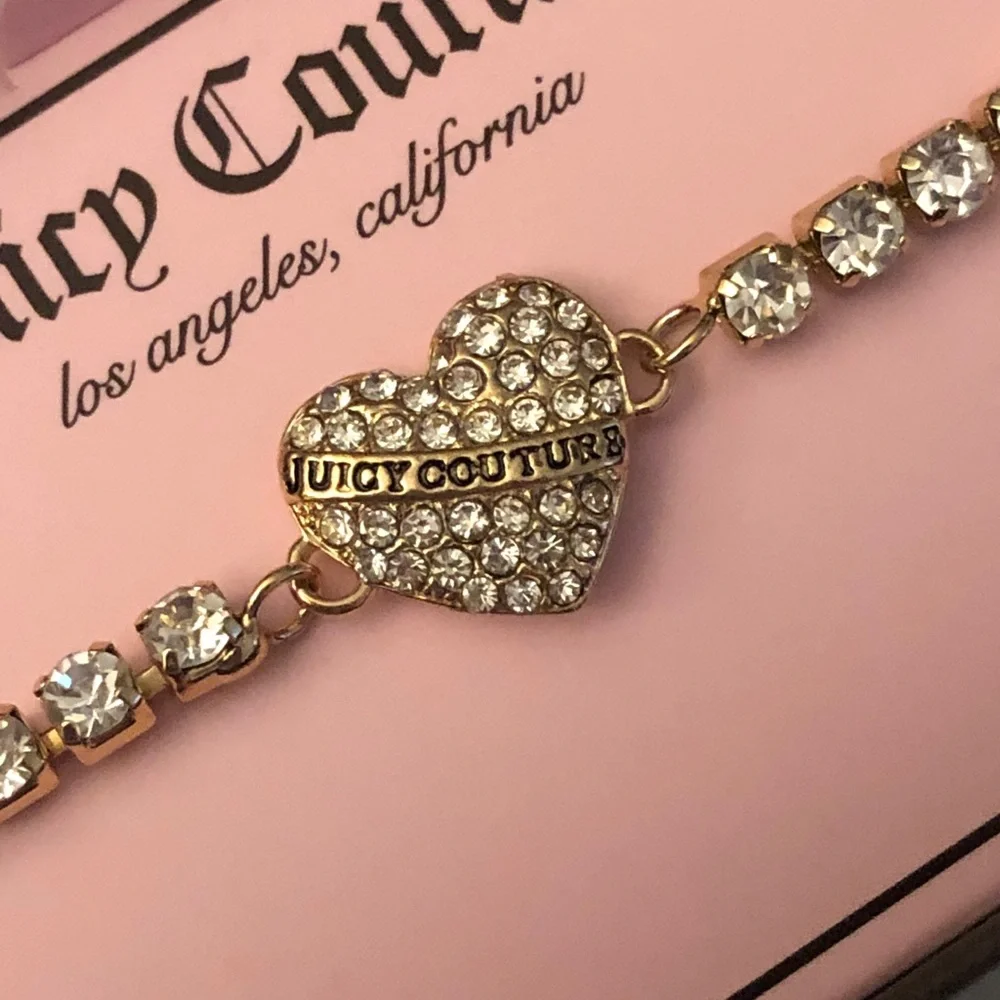 Juicy Couture Gold Tone Clear Crystal Tennis Bracelet Fixed Heart Charm NIB